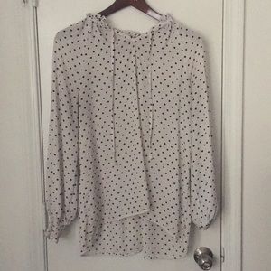 Cute dress up or dress down blouse.